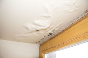 Ceiling water damage due to leaky roof 