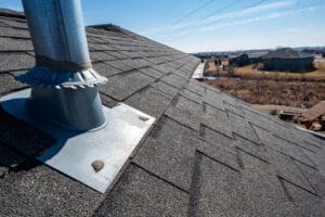 Flashing and weather sealing on vent chimney on a shingle roof
