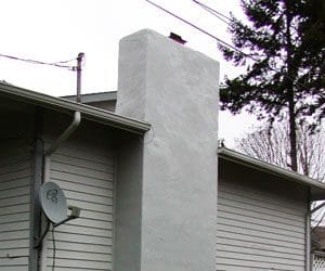 Stucco Chimneys in Roofing by Bruce